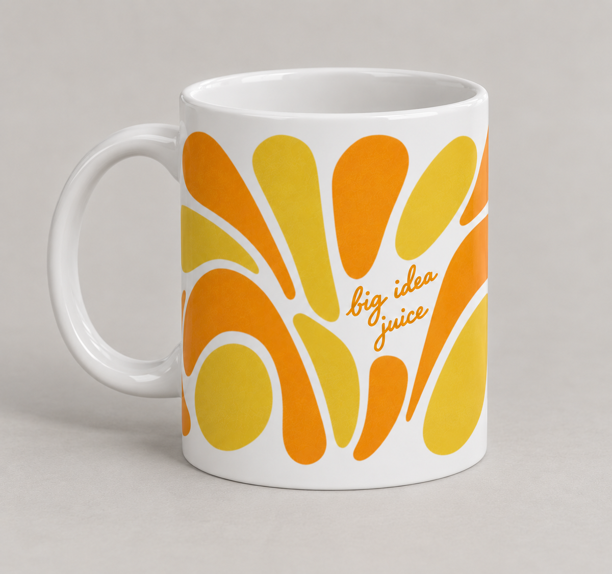 Big Idea Juice mug – white 11oz ceramic coffee mug with retro orange and yellow sunburst