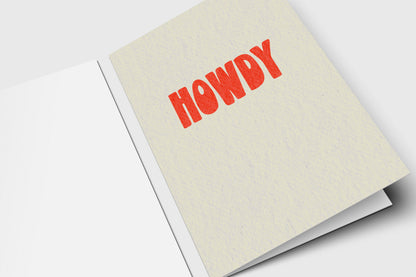 Minimalist Howdy card with bold red-orange retro letters on speckled cream