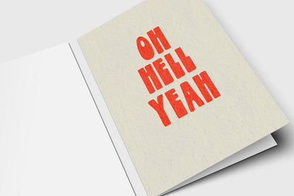 Oh Hell Yeah card with bold red-orange retro letters on speckled cream