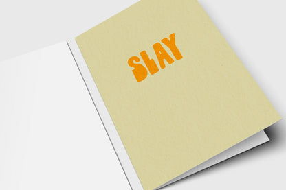 Minimalist Slay card with bold orange retro letters on pale yellow
