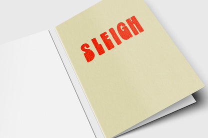 Minimalist Sleigh holiday card with bold red retro letters on pale yellow