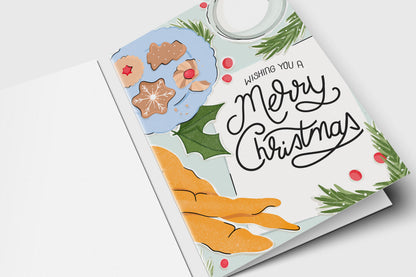 Merry Christmas card with a plate of gingerbread cookies, a glass of milk, holly and pine