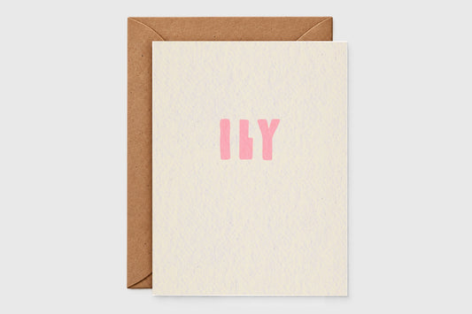 Minimalist ILY love card with soft pink letters on speckled cream