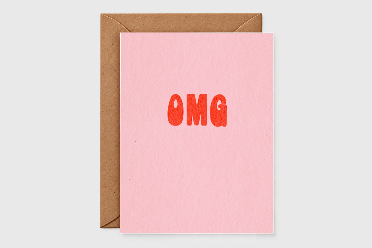 Minimalist OMG congrats card with red-orange retro letters on blush pink