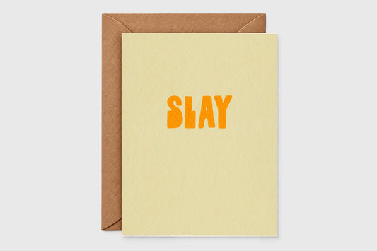 Minimalist Slay card with bold orange retro letters on pale yellow