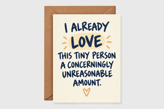 I Already Love This Tiny Person new baby card with navy hand-lettering and yellow accent on cream background