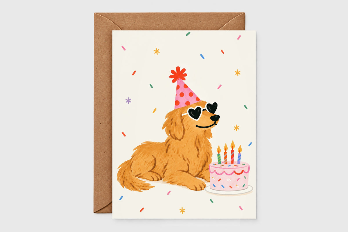 Golden retriever birthday card with party hat, heart sunglasses and sprinkle cake on cream background