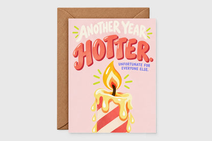 Another Year Hotter funny birthday card with striped melting candle on pink background