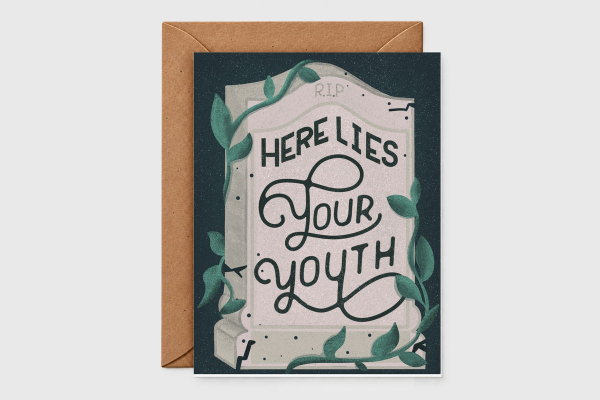 Funny birthday card with a hand-lettered tombstone reading 'Here Lies Your Youth' and ivy on dark green