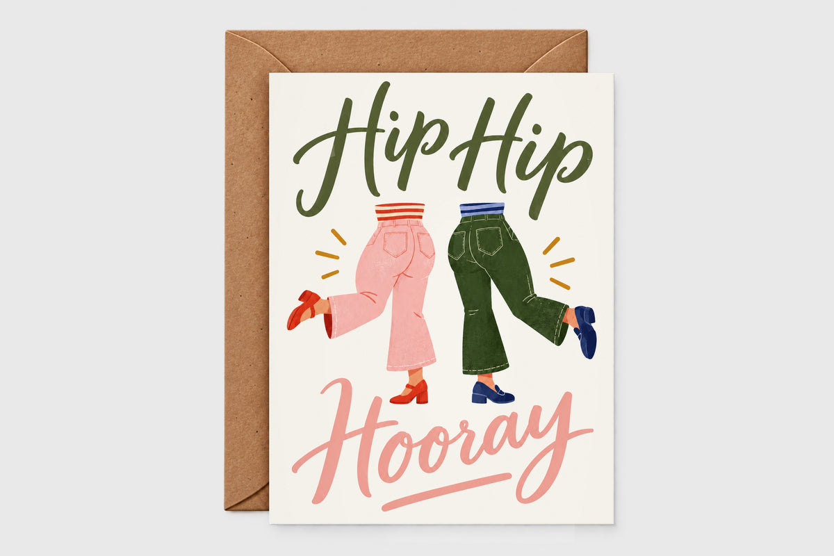Hip Hip Hooray congratulations card with retro illustration of two dancing legs in pink and green pants on cream background
