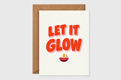 Let It Glow Diwali card with bold red lettering and illustrated diya candle on cream background