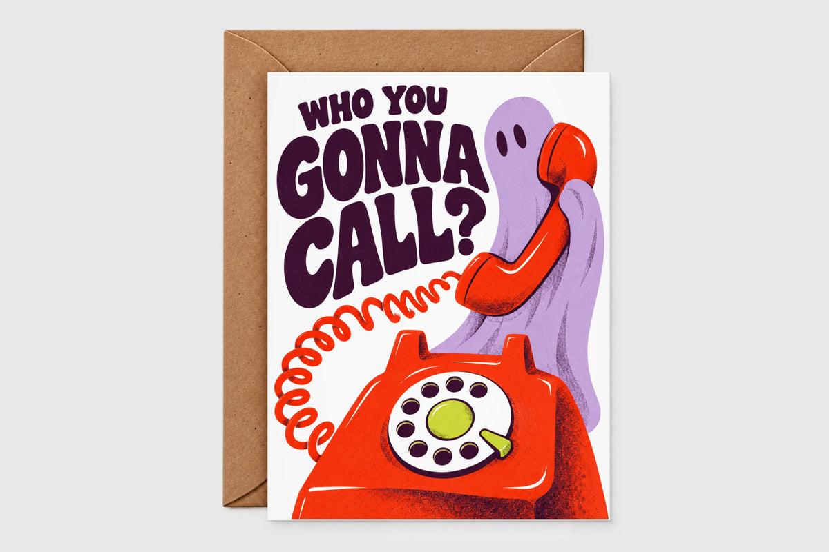 Who You Gonna Call Halloween card with a purple ghost on a red rotary phone, orange and purple retro design, with kraft envelope