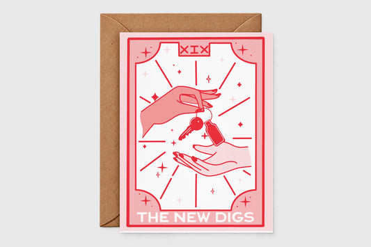 'The New Digs' tarot-style housewarming card in pink and red with hands passing keys