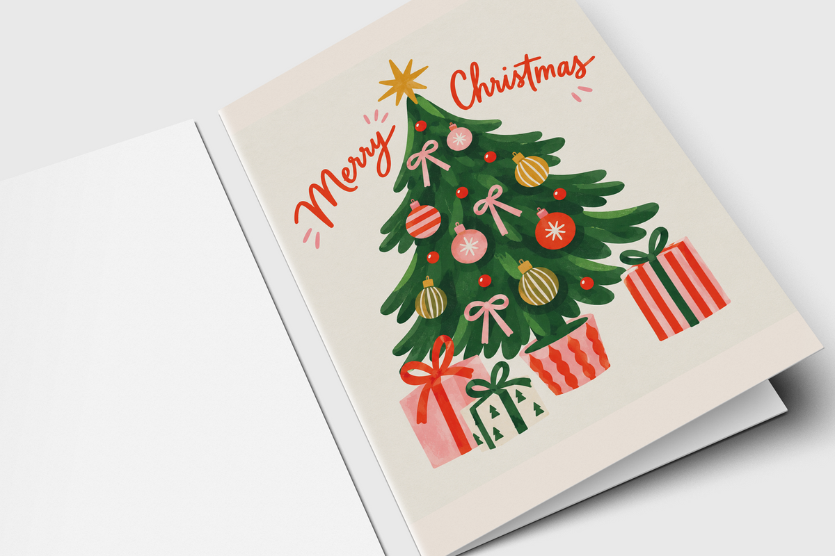 Watercolor Christmas tree card with pastel ornaments, gold ribbon bows and wrapped presents under the tree