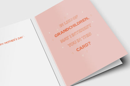 Funny Mother's Day card in orange on pink: 'In lieu of grandchildren, may I interest you in this card?'